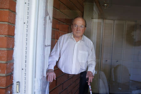 Roland Gilbert, a blind 86-year-old Franklin County resident, stands for a portrait at his home in Columbus, Ohio U.S., October 28, 2016. REUTERS/Shannon Stapleton