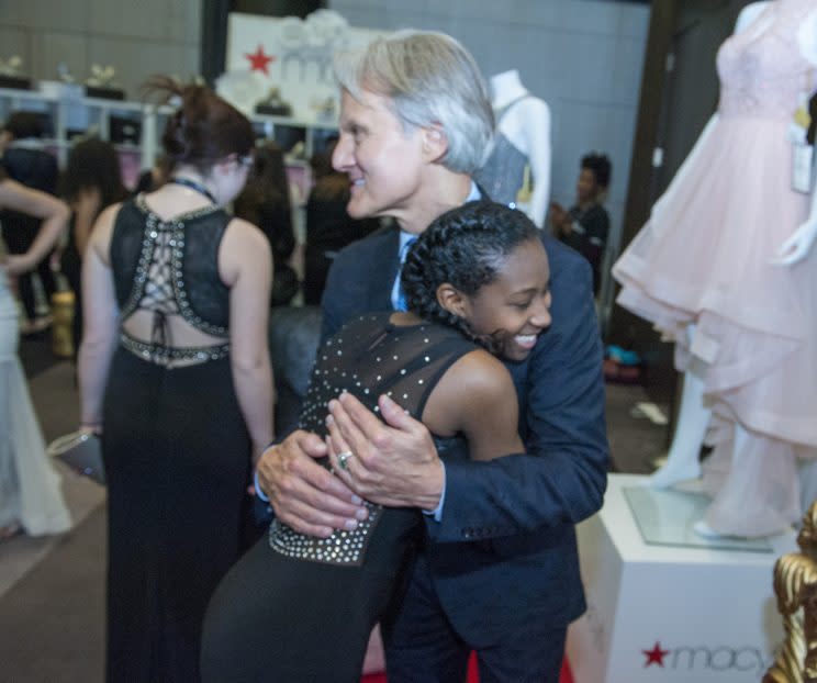 Shivel Nancoo, an 18-year-old from Queens, selects a black gown for prom. Monte Durham, from TLC’s “Say Yes to the Dress” show, helped the girls put their looks together. (Photo courtesy Discovery Communications)