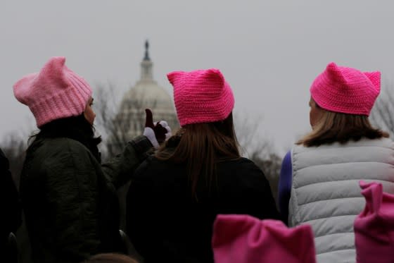 Women wearing pink pussy protest hats gather in front of the U.S. Capitol for the Women's March on Washington, following the inauguration of President Donald Trump, in Washington on January 21, 2017. <span class="copyright">Brian Snyder—Reuters</span>