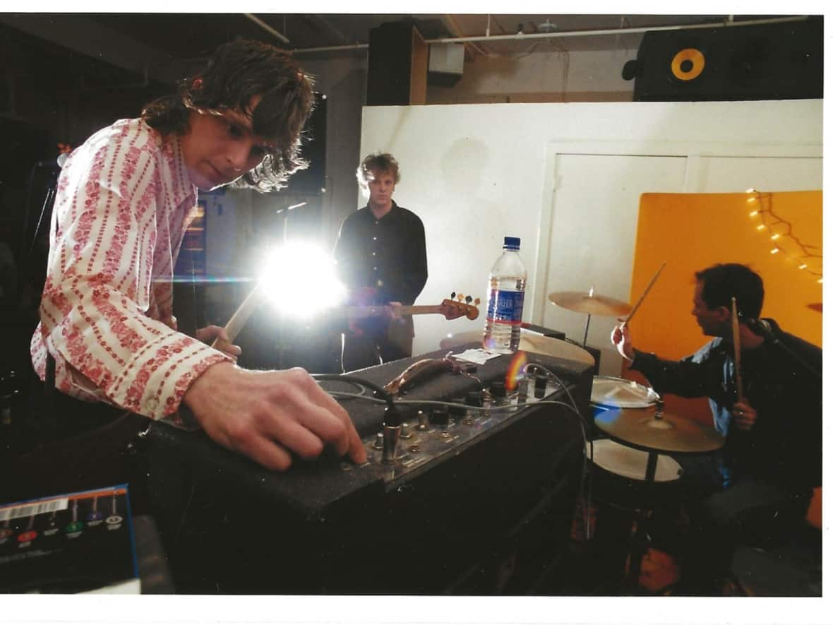 The Joel Plaskett Emergency — Joel Plaskett, left, Tim Brennan, centre, and Dave Marsh — are shown during the recording of Down at the Khyber in late 2000. (Greg Baller - image credit)