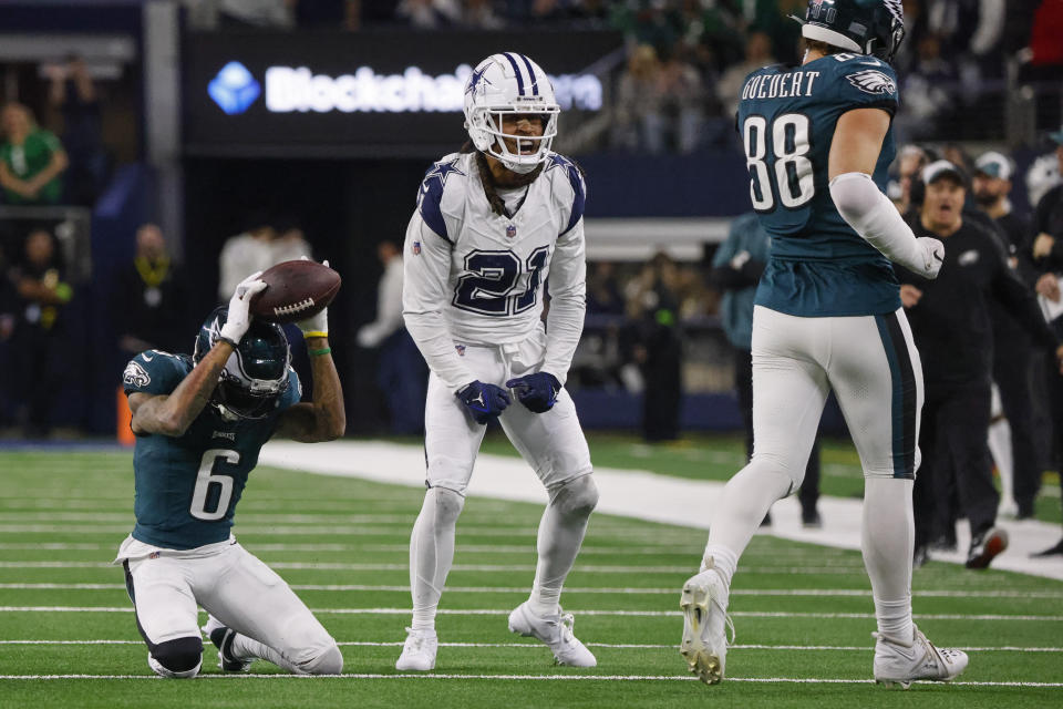 Dallas Cowboys cornerback Stephon Gilmore (21) reacts after making a tackle on Philadelphia Eagles wide receiver DeVonta Smith (6) on a fourth-down play during the second half of an NFL football game, Sunday, Dec. 10, 2023, in Arlington, Texas. (AP Photo/Michael Ainsworth)