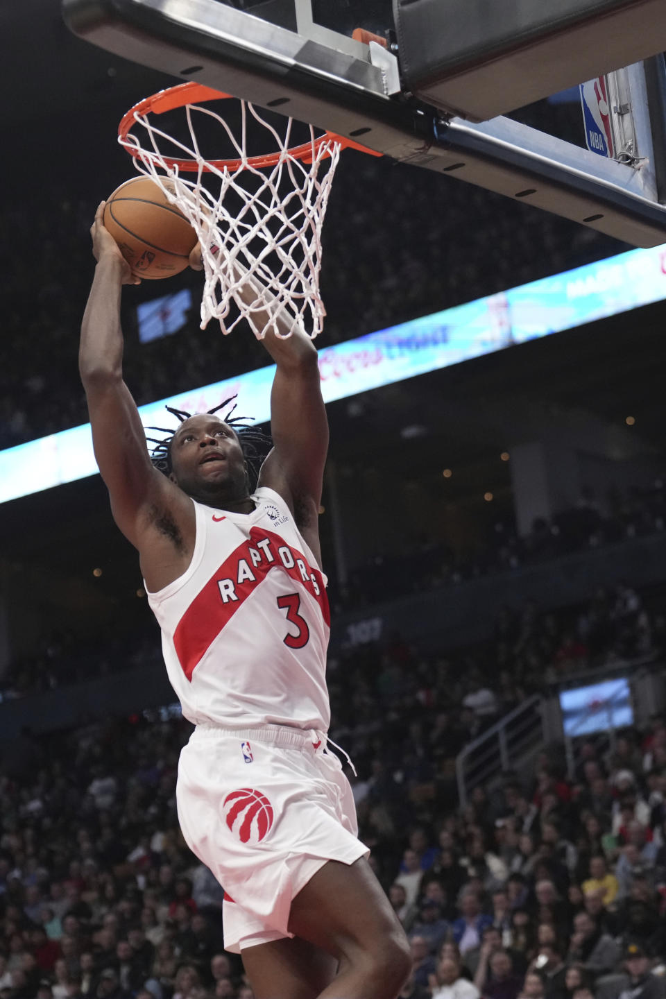 Toronto Raptors forward O.G. Anunoby slam-dunks against the Portland Trail Blazers during first-half NBA basketball game action in Toronto, Monday, Oct. 30, 2023. (Nathan Denette/The Canadian Press via AP)