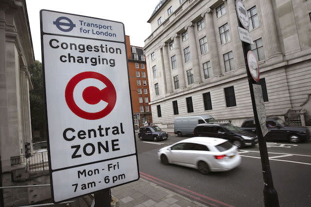 File photo dated 08/08/14 of a congestion charge sign in London. Foreign embassies and international organisations have racked up debts on unpaid congestion charge totalling more than &pound;100 million since the levy's introduction in London in 2003, Boris Johnson has disclosed.
