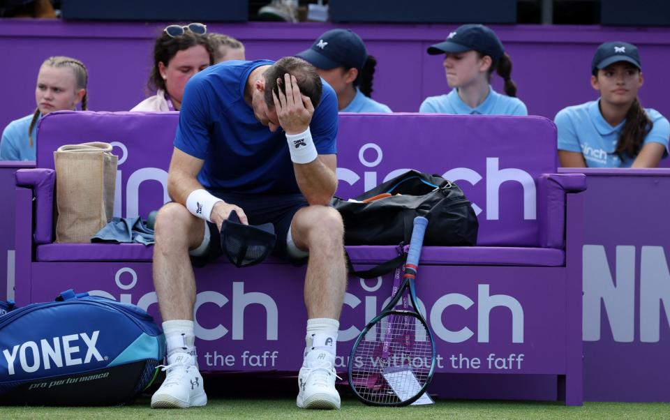 Andy Murray with his head in his hands