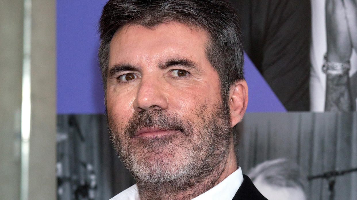 Simon Cowell, who seems to save his softer side for animals, helped a family retrieve a lost dog by offering a large reward. (Photo: Getty Images)