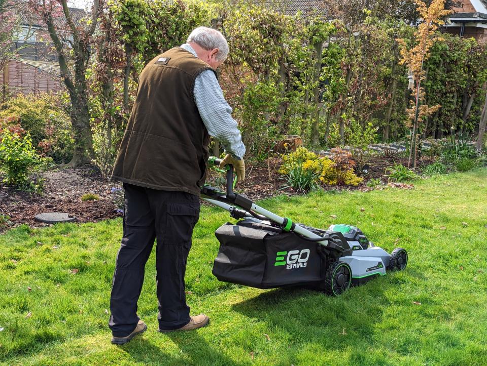 A picture of Steve mowing with the EGO LM2130E, showing the path it makes in long grass