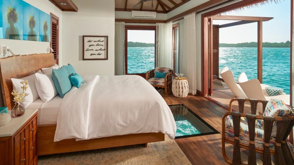 <p>Courtesy image</p><p>Located on Crab Pond Bay on the southwestern coast of Jamaica, the adults-only Sandals South Coast delivers incredible views of the Caribbean Sea. Designed with luxury in mind, each of the resort's <a href="https://www.sandals.com/south-coast/rooms-suites/details/?categoryCode=OWB" rel="nofollow noopener" target="_blank" data-ylk="slk:overwater bungalows;elm:context_link;itc:0;sec:content-canvas" class="link ">overwater bungalows</a> has hardwood floors, vaulted ceilings, a king-size bed, a walk-in rain shower, an extended sun deck, and an outdoor shower. Bungalow guests also receive butler service, 24-hour room service, private car transfers from the airport, and a welcome gift. Should you choose to venture from your bungalow, the resort offers nine restaurants, a spa, a state-of-the-art fitness center, and a wide range of land activities and local adventure tours.</p><p>[From $1,665 per night; <a href="https://www.sandals.com/south-coast/" rel="nofollow noopener" target="_blank" data-ylk="slk:sandals.com;elm:context_link;itc:0;sec:content-canvas" class="link ">sandals.com</a>]</p>