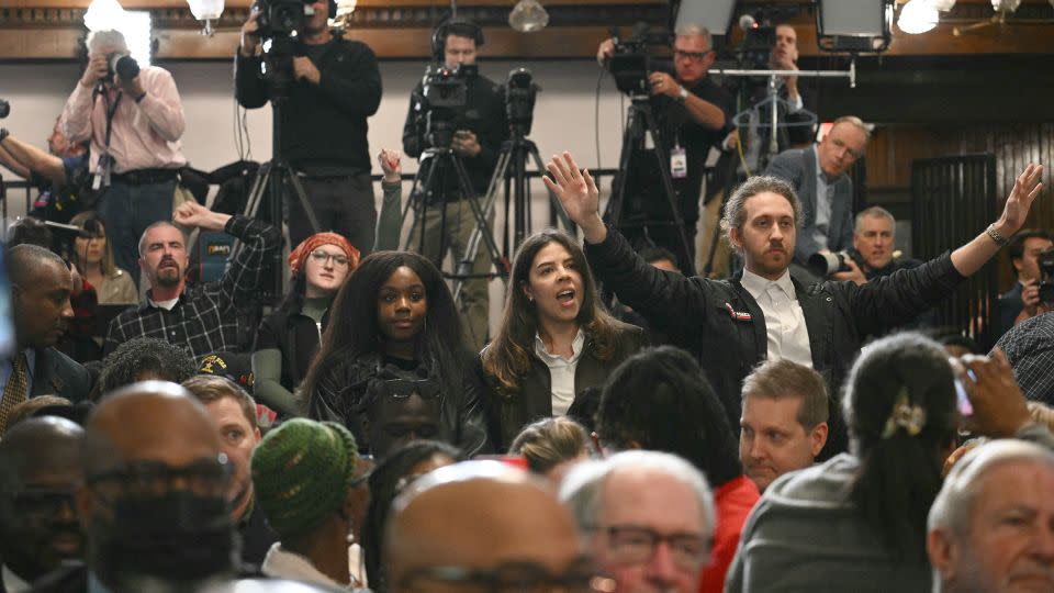 Protestors call for a ceasefire in the Gaza Strip as US President Joe Biden speaks at Mother Emanuel AME church at a campaign event in Charleston, South Carolina, on January 8, 2024. - Mandel Ngan/AFP/Getty Images