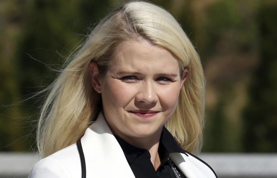 FILE - In this Sept. 13, 2018, file photo, Elizabeth Smart arrives for a news conference in Salt Lake City. Smart says she’s been “reassured” the woman who helped kidnap her when she was 14 and stood by as she was sexually assaulted will be watched when she’s released from prison. Appearing in an interview Tuesday, Sept. 18, on “CBS This Morning,” Smart said she believes Wanda Barzee remains a danger. (AP Photo/Rick Bowmer, File)