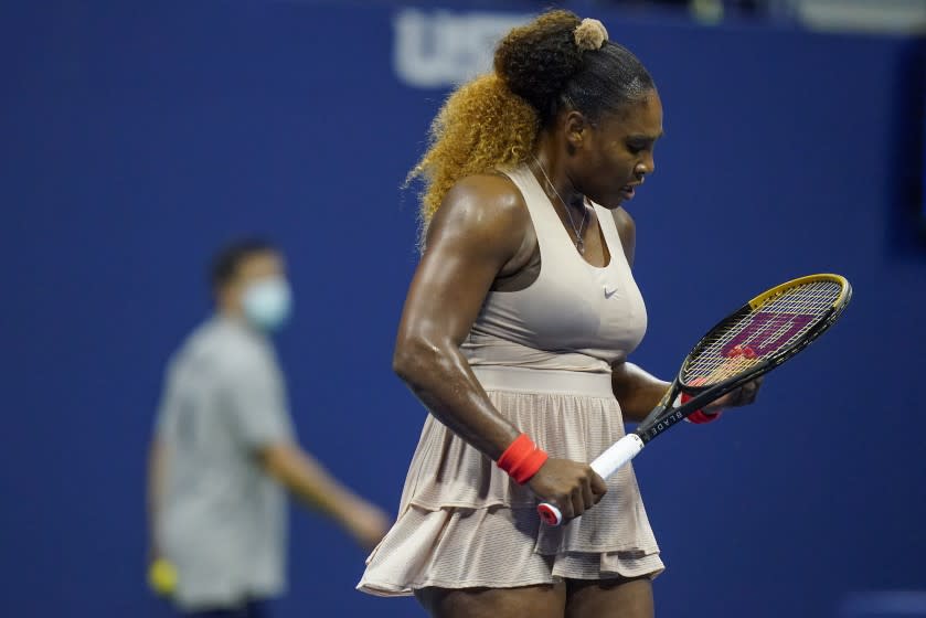 Serena Williams, of the United States, reacts during the second set against Victoria Azarenka, of Belarus.