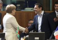 German Chancellor Angela Merkel (L) shakes hands with Greek Prime Minister Alexis Tsipras (R) at the start of an EU-CELAC Latin America summit in Brussels, Belgium June 10, 2015. REUTERS/Yves Herman
