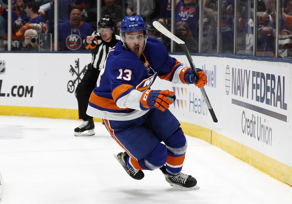 New York Islanders center Mathew Barzal (13) celebrates his goal against the Tampa Bay Lightning in the second period of Game 4 of an NHL hockey Stanley Cup semifinal, Saturday, June 19, 2021, in Uniondale, N.Y. (AP Photo/Jim McIsaac)