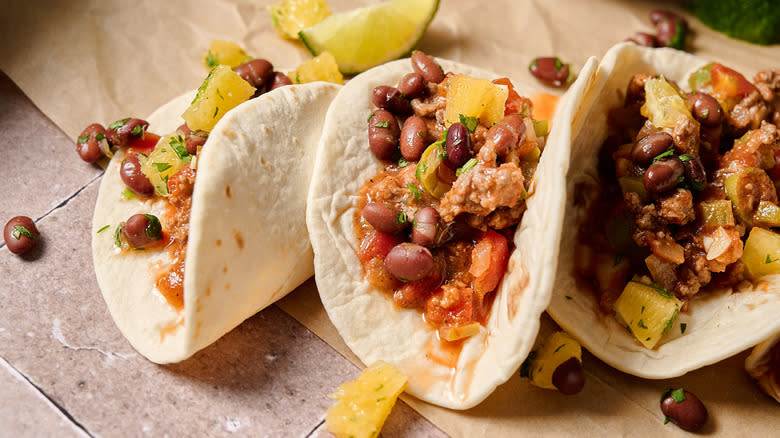 picadillo tacos on table