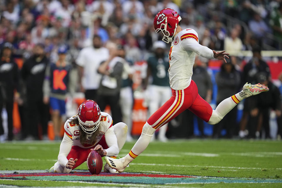 Kansas City Chiefs kicker Harrison Butker wearing one Nike cleat and one Adidas cleat during Super Bowl 57. - Credit: Cooper Neill/Getty Images