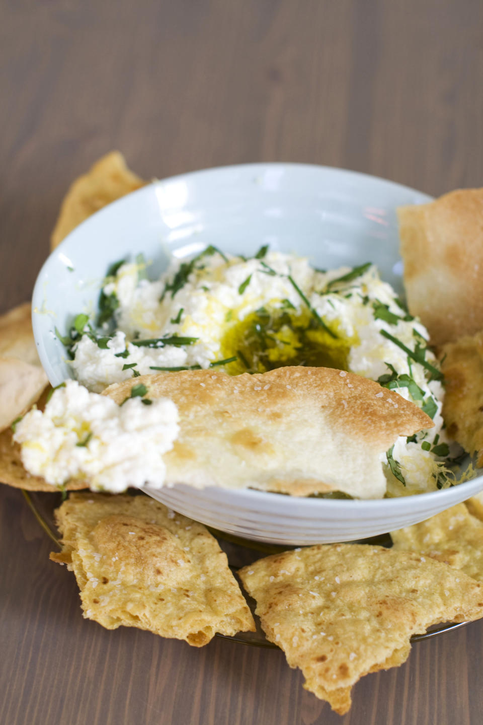 In this image taken on December 3, 2012, buttermilk ricotta cheese dip with homemade crackers is shown in a serving dish in Concord, N.H. (AP Photo/Matthew Mead)