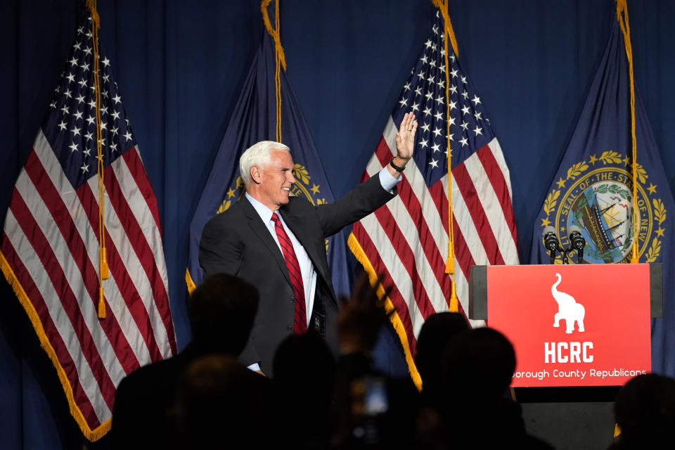 Former Vice President Mike Pence waves after speaking at the annual Hillsborough County NH GOP Lincoln-Reagan Dinner, Thursday, June 3, 2021, in Manchester, N.H. (AP Photo/Elise Amendola)