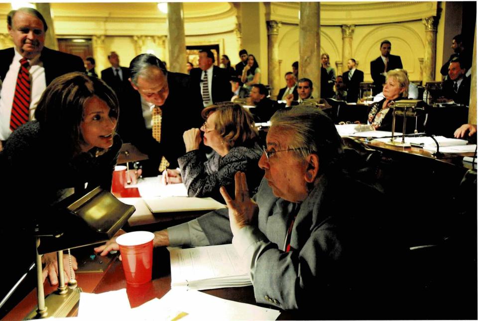 Practicing the politics of persuasion. I&rsquo;m on the Senate floor trying to wrangle a yes vote on the school funding bill from Republican Sen. Joseph A. Palaia, with Senate President Dick Codey looking on. In the end Sen. Palaia switched his no vote to a yes. (Photo: Photo Courtesy of Barbara Buono)