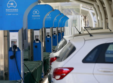 An Electric Vehicle (EV) charging station is seen at a factory of Beijing Electric Vehicle, funded by BAIC Group, in Beijing, China, January 18, 2016. REUTERS/Kim Kyung-Hoon