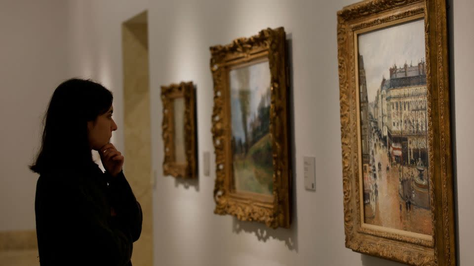 The painting (far right) on display at Madrid's Thyssen-Bornemisza museum, which acquired the work in 1993. - Susana Vera/Reuters