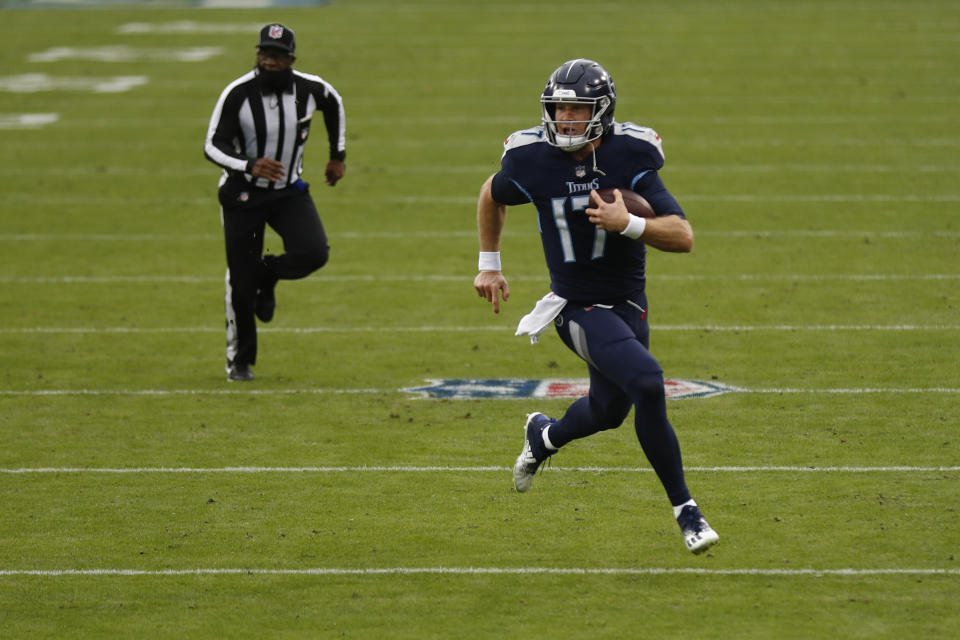 Tennessee Titans quarterback Ryan Tannehill runs for a touchdown against the Detroit Lions during the first half of an NFL football game Sunday, Dec. 20, 2020, in Nashville, N.C. (AP Photo/Wade Payne)