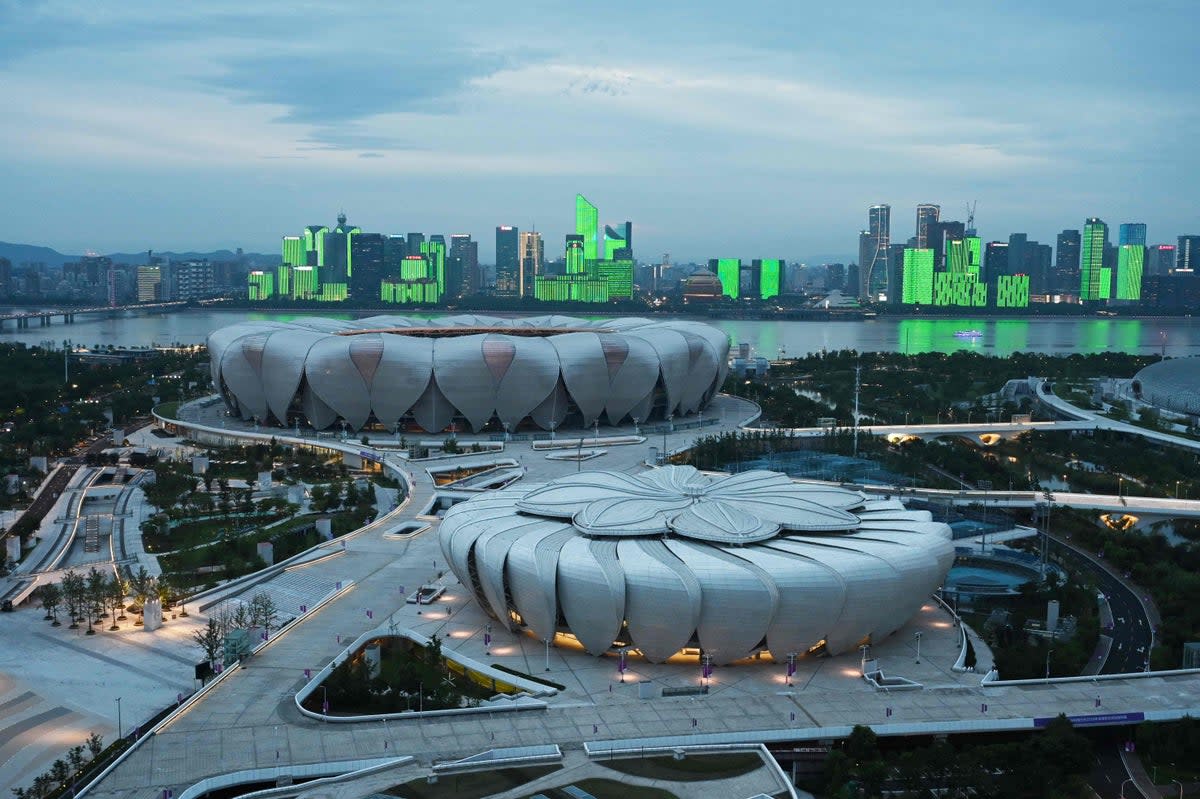 Hangzhou Olympic Sports Center Stadium (back) and Tennis Centre (front) which will host competition at the Asian Games in Hangzhou (AFP via Getty Images)