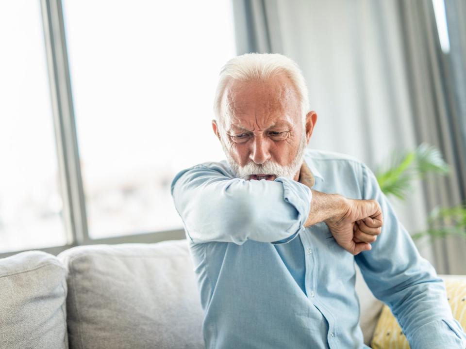 A new persistent cough remains one of the key symptoms of Indian variant Covid  (Getty)