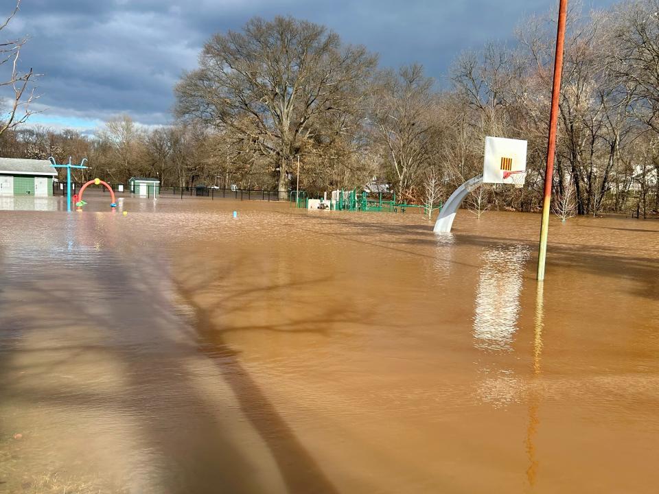 Flooding along the Peters Brook into the Mercer Street Park in Somerville Thursday morning.