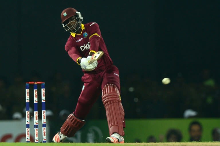 West Indies cricket team captain Darren Sammy plays a shot during the second and final T20 International cricket match between Sri Lanka and the West Indies in Colombo on November 11, 2015