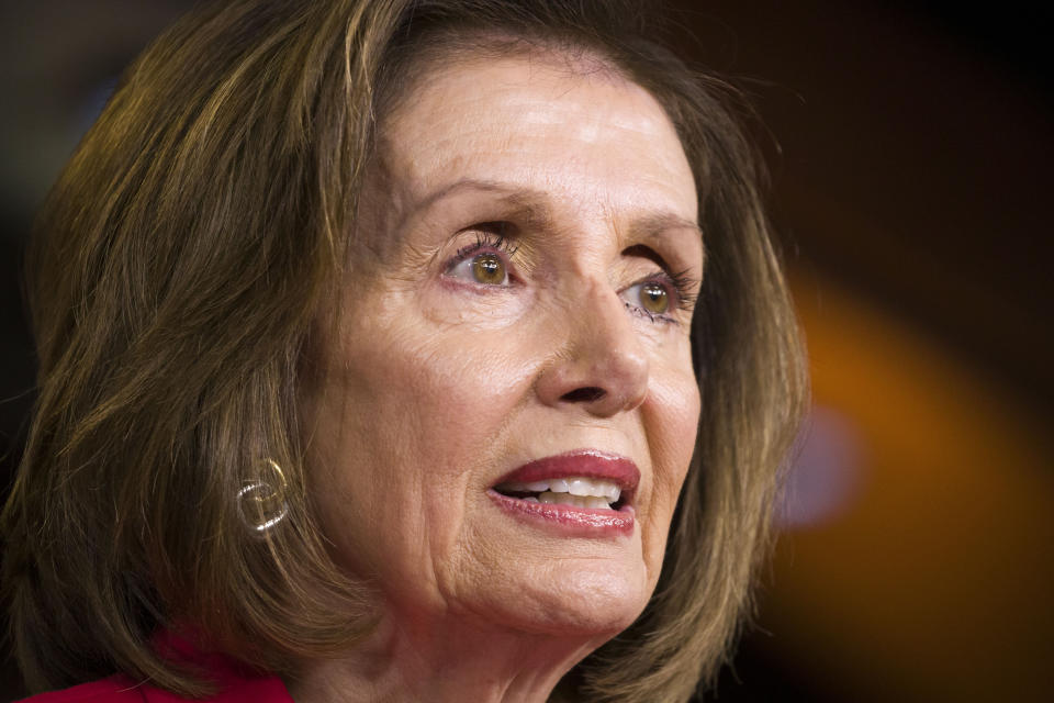 FILE - In this June 27, 2019, file photo, House Speaker Nancy Pelosi of Calif., speaks during her weekly media availability on Capitol Hill in Washington. They don’t talk to each other much, Pelosi and Rep. Alexandria Ocasio-Cortez — but they certainly speak past one another, in a very public way that now threatens the House agenda. (AP Photo/Alex Brandon, File)