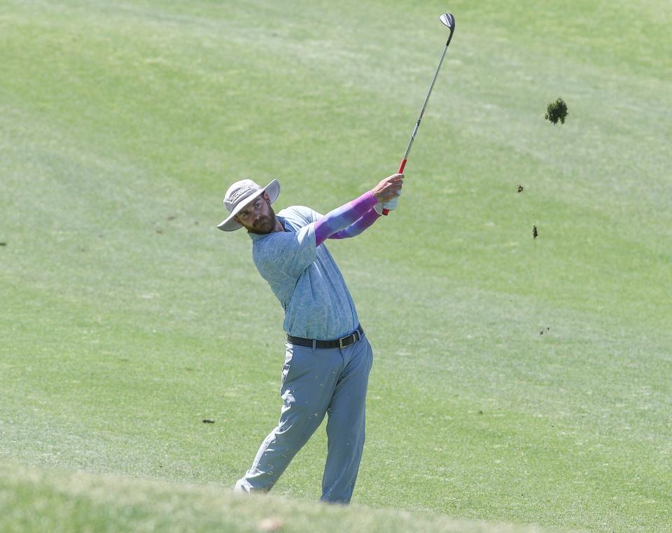 Scott Cherry of Rancho Mirage hits his second shot on the first hole on the Grove Course at Indian Ridge Country Club during round one of the U.S. Open local qualifying in Palm Desert, Calif., May 6, 2024.
