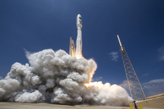 A United Launch Alliance Atlas 5 rocket launches the classified spy satellite NROL-67 into orbit for the National Reconnaissance Office on April 10, 2014 in a mission that lifted off from Space Launch Complex-41 at Cape Canaveral Air Force Stat