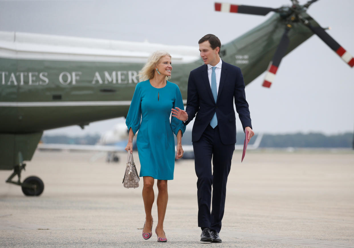 Kellyanne Conway and Jared Kushner at Joint Base Andrews, Md.