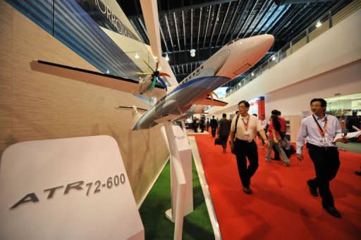 A model of an ATR series plane is exhibited at the Singapore Airshow on February 16, 2012. Indonesia's fast growing Lion Air, which earlier this week sealed a record 22.4 billion USD deal for 230 Boeing jets, ordered 27 smaller aircraft from European manufacturer ATR on February 16