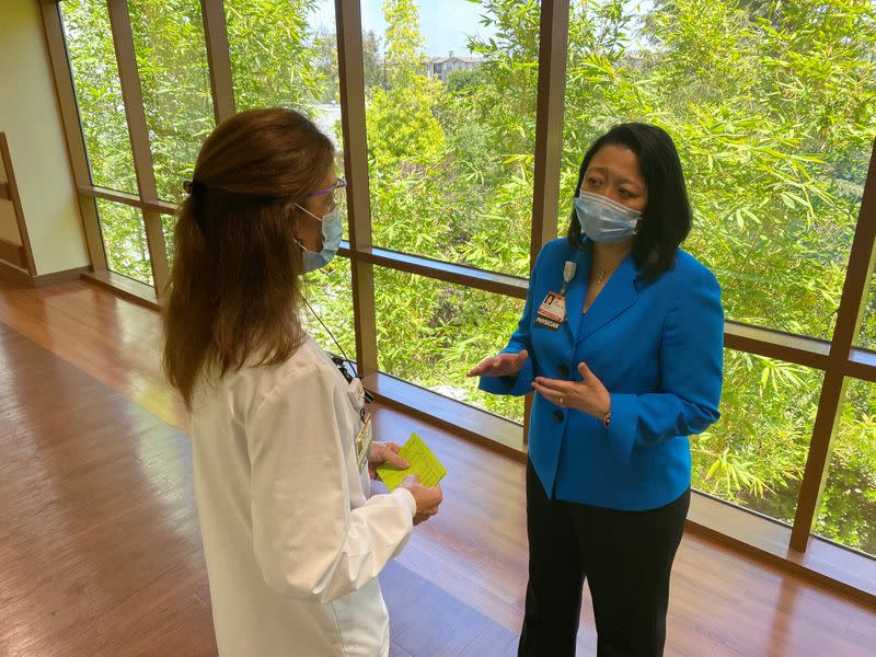 Dr Lynn Jeffers talks to registered nurse Karen Magnani at St. John's Regional Medical Center in Oxnard