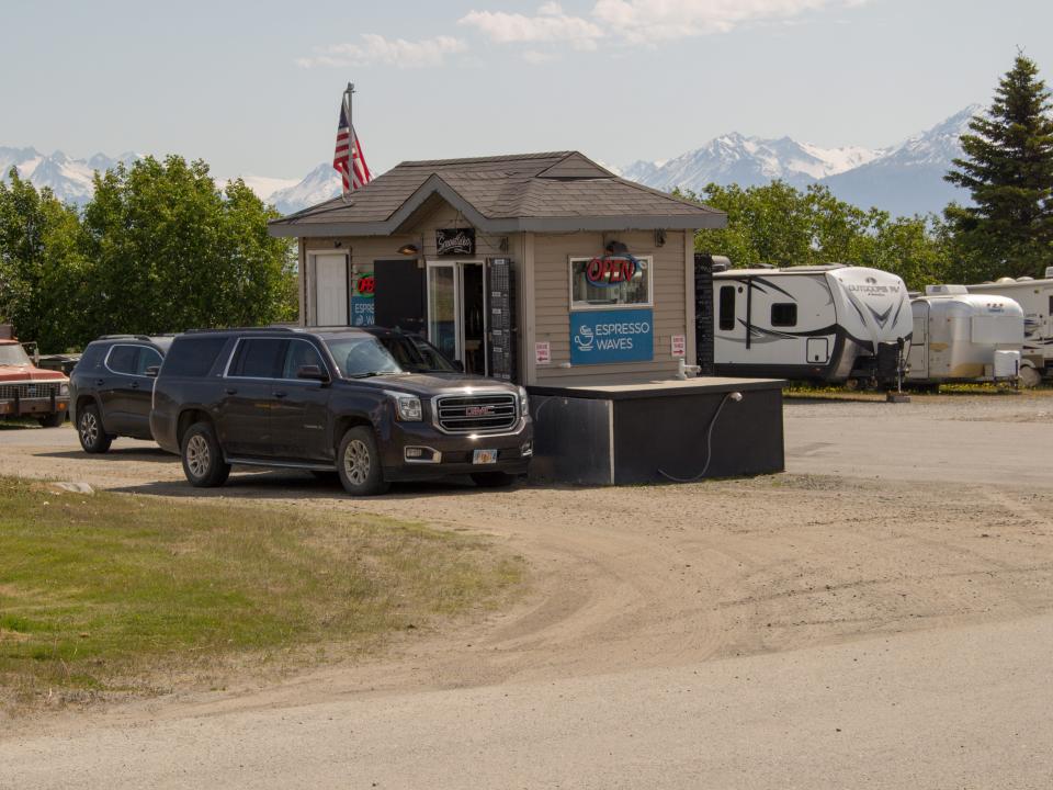 A brown coffee stand off of the road in Alaska