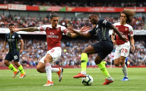 Hector Bellerin of Arsenal and Raheem Sterling of Manchester City - Credit: GETTY IMAGES