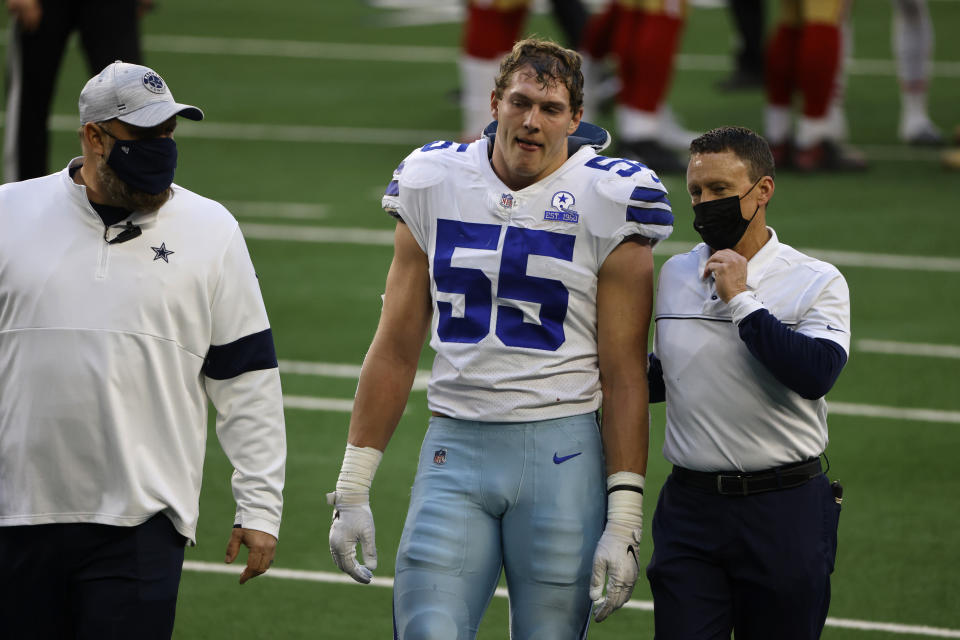 File-This Dec. 20, 2020, file photo shows Dallas Cowboys linebacker Leighton Vander Esch (55) walking off the field after an injury during the second half of an NFL football game against the San Francisco 49ers in Arlington, Texas. The Dallas Cowboys declined the fifth-year option on Vander Esch's rookie contract Monday, May 3, 2020, setting up an interesting season at the position after the club used this year's first-round pick on a potential replacement. (AP Photo/Ron Jenkins, File)