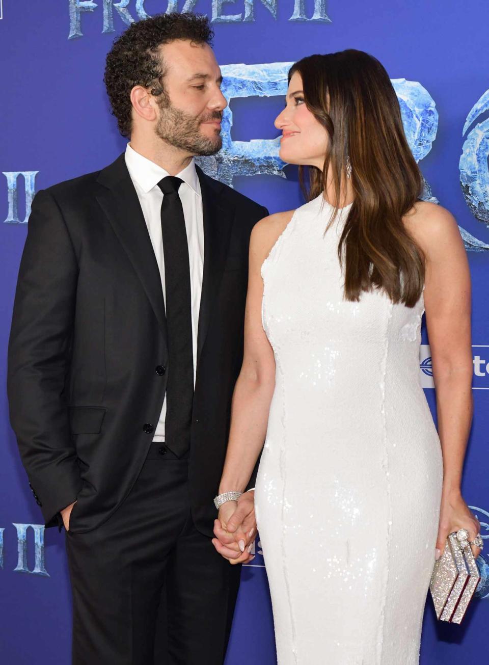 Aaron Lohr and Idina Menzel attend the Premiere of Disney's "Frozen 2" at Dolby Theatre on November 07, 2019 in Hollywood, California