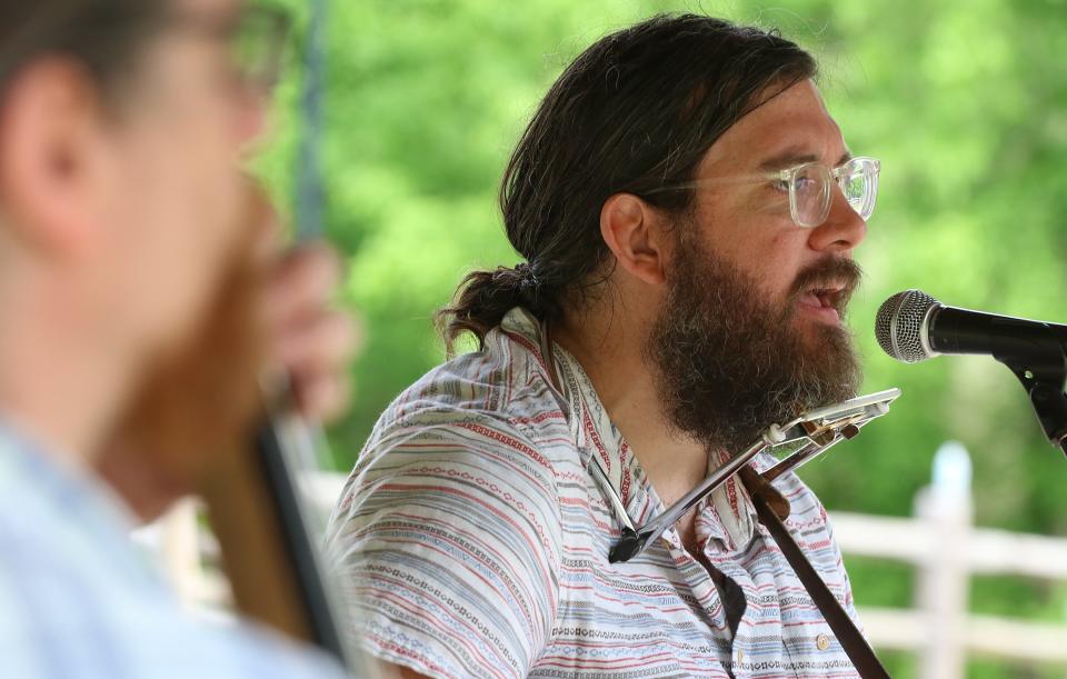 Jeremy Davis sings with the band “Elonzo Wesley” during the Goat Island Games held Saturday, May 7, 2022, in Cramerton.