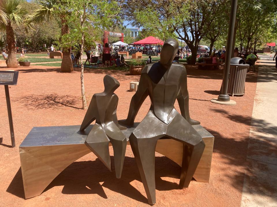 "Sharing A Story" by Marie-Pierre Phillippe-Lohezic of Laguna Hills, Calif. sits outside at the Town Square park in St. George. The piece, part of the past season of the Art Around the Corner outdoor gallery, was recently purchased by the city of Bountiful.
