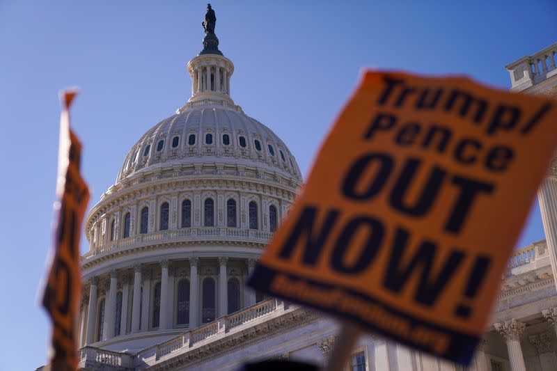 Impeachment Protesters Gather Outside of the Capitol