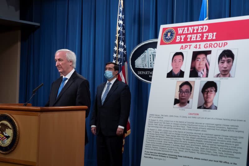 Justice Department's news conference to announce charges in China-related intrusion campaigns, in Washington