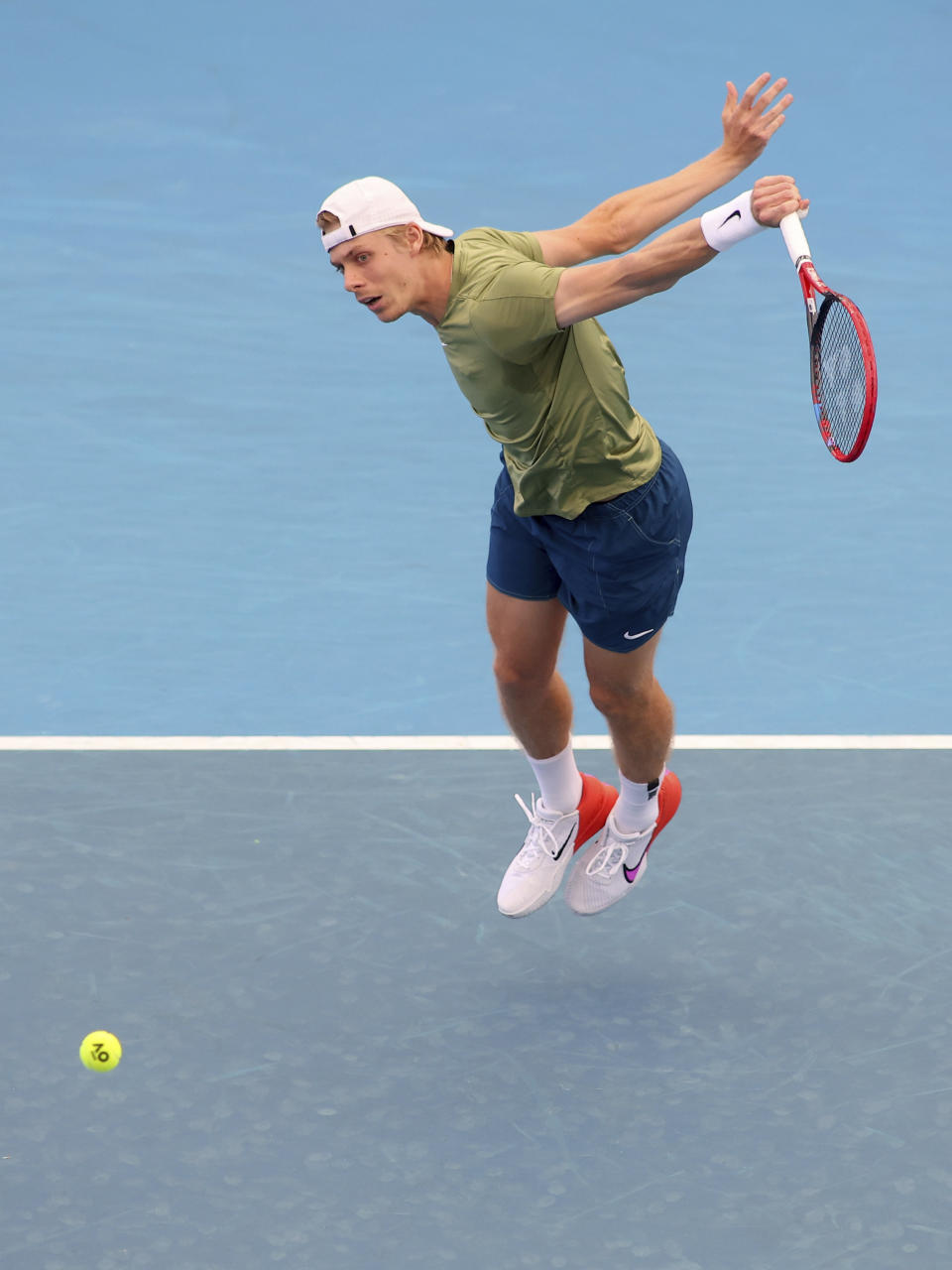 Canada's Denis Shapovalov plays a shot to Russia's Roman Safiullin during their Round of 16 match at the Adelaide International Tennis tournament in Adelaide, Australia, Thursday, Jan. 5, 2023. (AP Photo/Kelly Barnes)