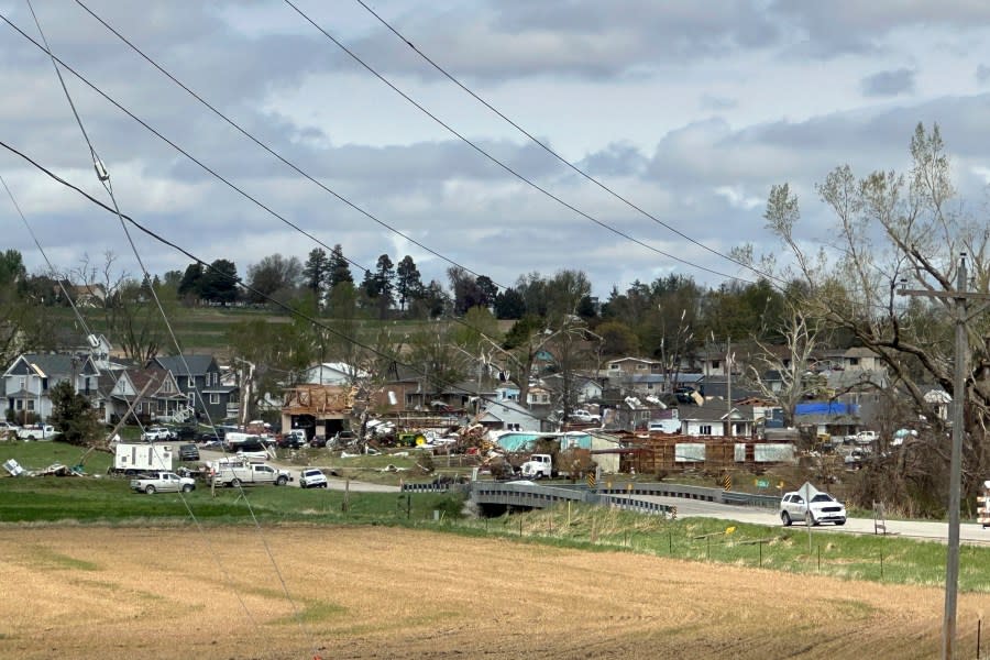 Damage is seen to a neighborhood after a tornado moved through the area in Minden, Iowa, Saturday, April 27, 2024. The Friday night tornadoes wreaked havoc in the Midwest, causing a building to collapse with dozens of people inside and destroying and damaging hundreds of homes. (AP Photo/Nick Ingram)