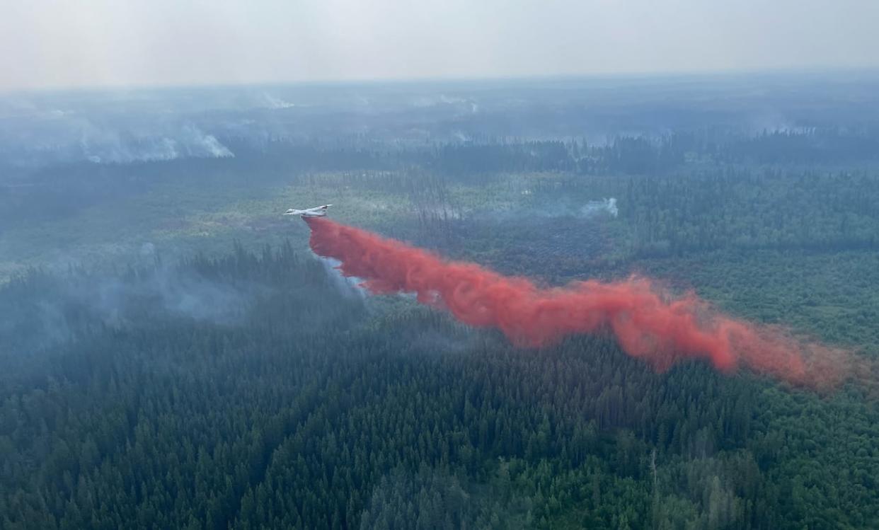 Firefighters and support staff are working to contain wildfires burning in northern Alberta. (Alberta Wildfire - image credit)