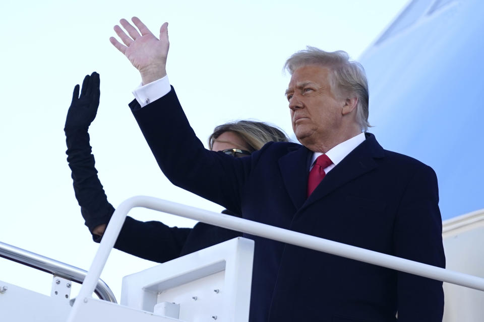 President Donald Trump and first lady Melania Trump board Air Force One at Andrews Air Force Base, Md., Wednesday, Jan. 20, 2021.(AP Photo/Manuel Balce Ceneta)