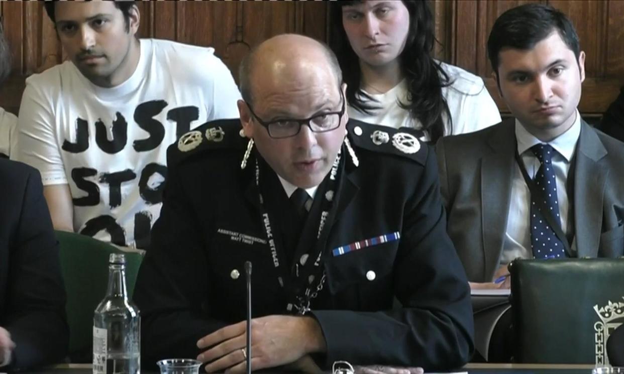 <span>Just Stop Oil protesters behind Met police assistant commissioner Matt Twist as he addresses a select committee in parliament last year.</span><span>Photograph: House of Commons/UK Parliament/PA</span>