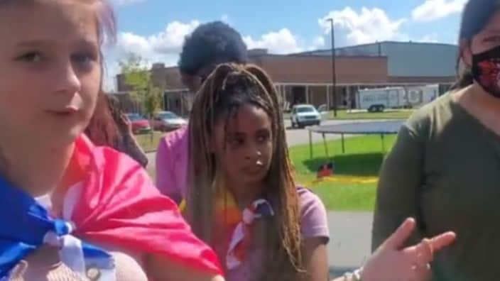 Coosa High student Lilyan Huckaby (left) told a reporter she was “yelling and loud” during their meeting with administrators. “All the African Americans, they suspended them, and they didn’t suspend them,” she said, motioning toward other white and Hispanic students protesting. (Photo: Screenshot/Twitter)