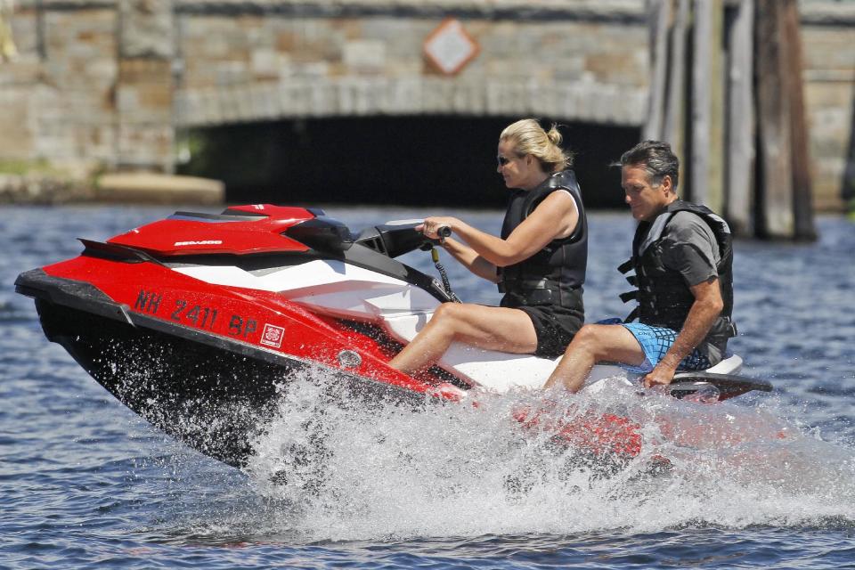 Republican presidential candidate Mitt Romney, former Massachusetts Gov. and wife Ann Romney jet ski on Lake Winnipesaukee in Wolfeboro, N.H., Monday, July 2, 2012. (AP Photo/Charles Dharapak)