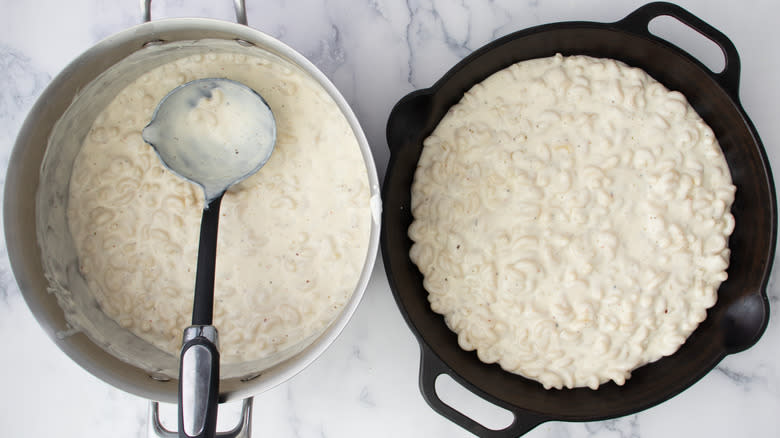 cheesy macaroni in skillet and pot